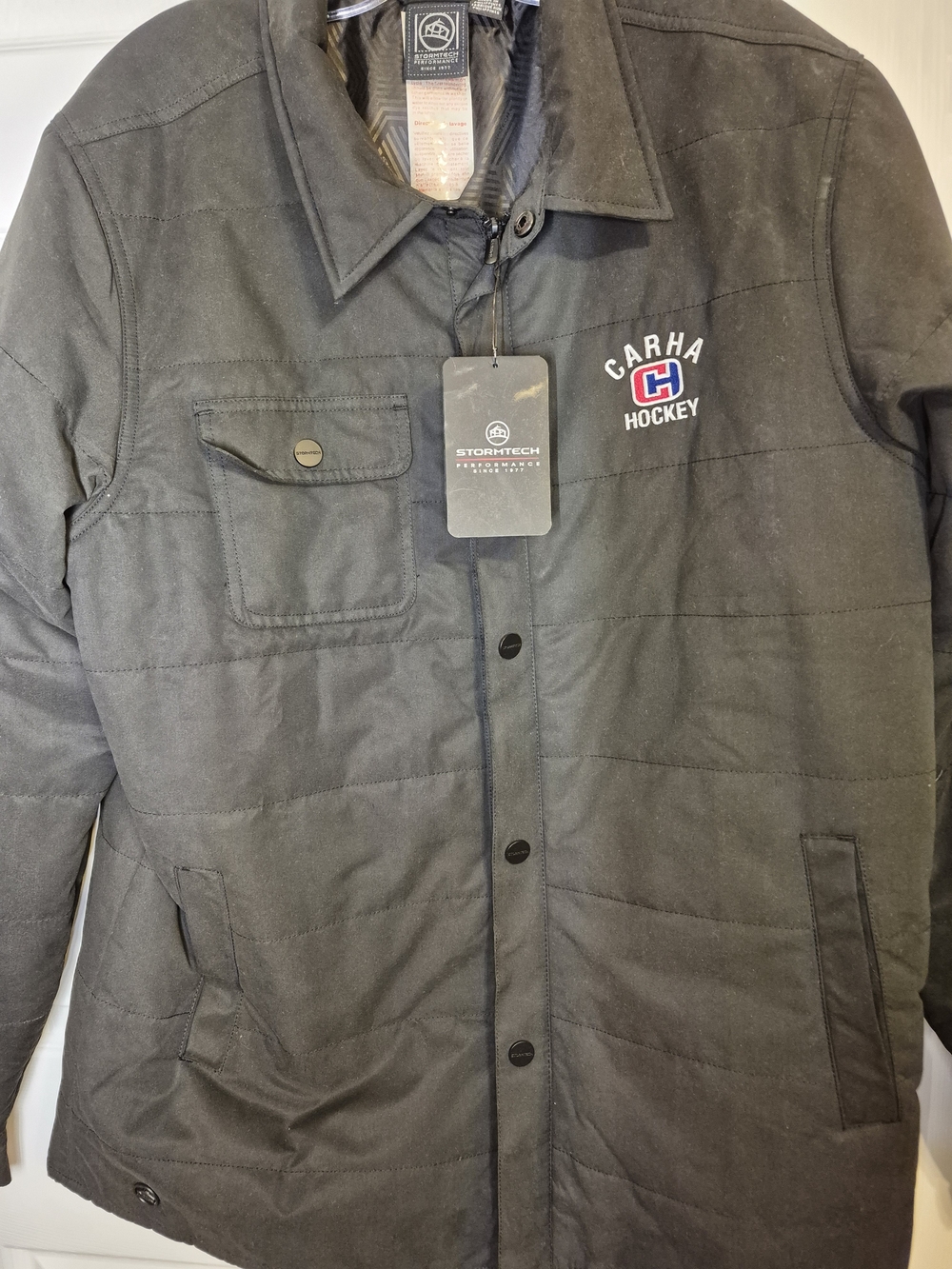Storm Men's Black Quilted Puffer Light Jacket with Carha Hockey Patch